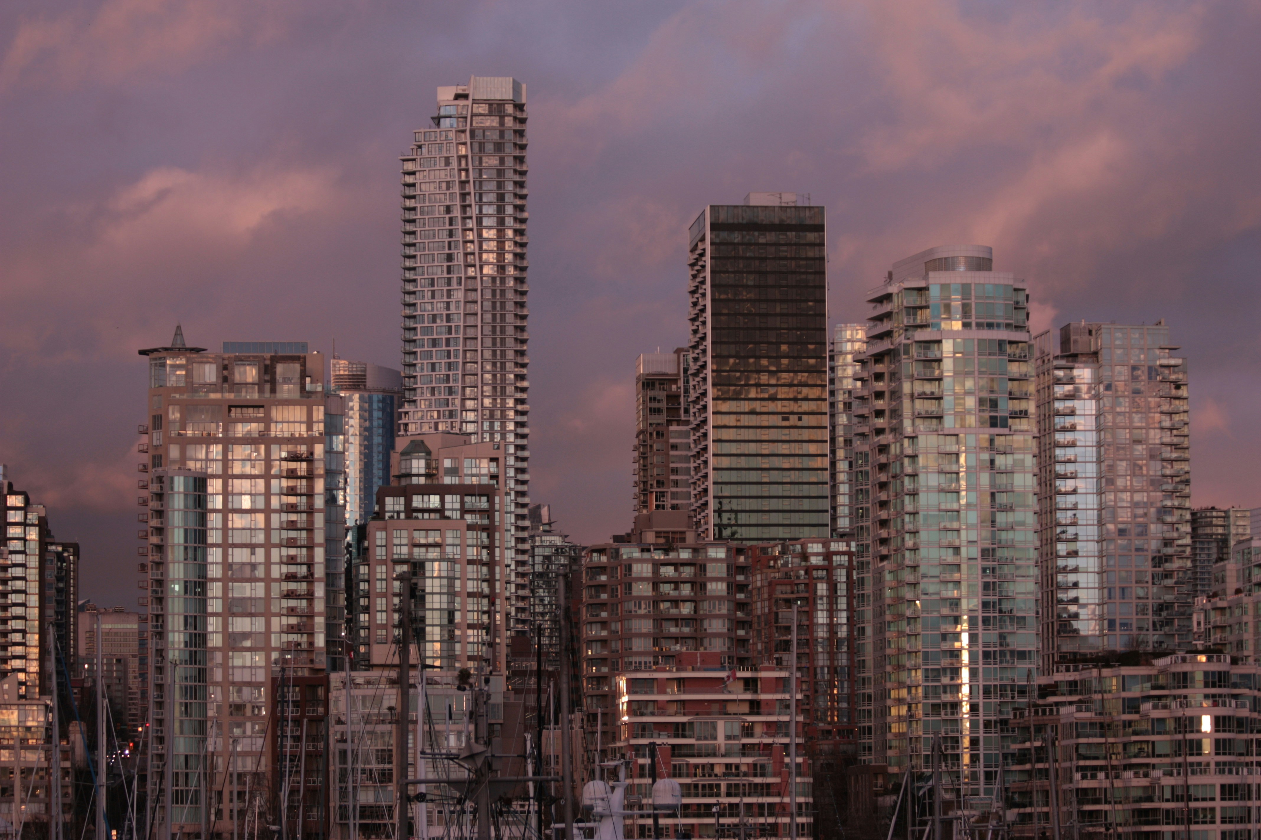 a group of tall buildings sitting next to each other